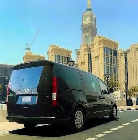 Black Hyundai Staria van near the Makkah Clock Tower